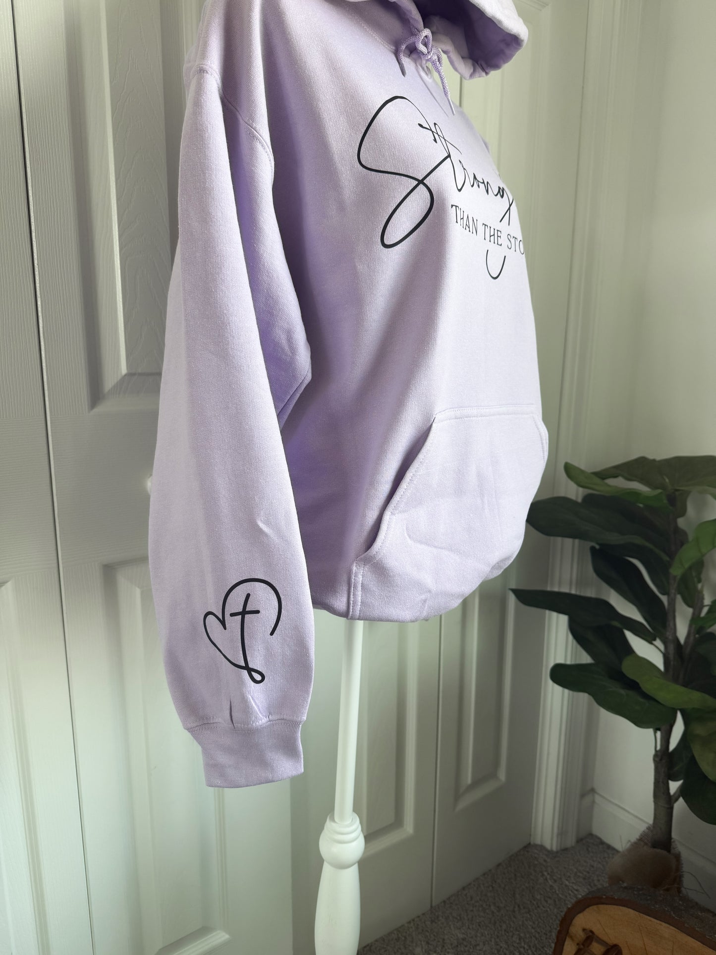 Stronger Than The Storm Hoodies with sleeve print